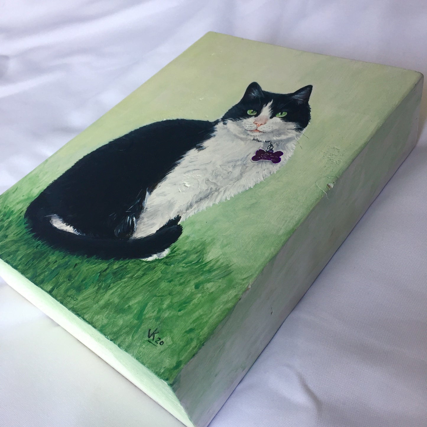 Schilderij Kat op houten blok